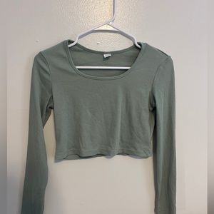 A teal/green crop top